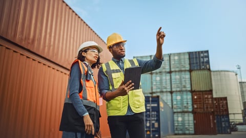 Black African technician in hard hat safety vest