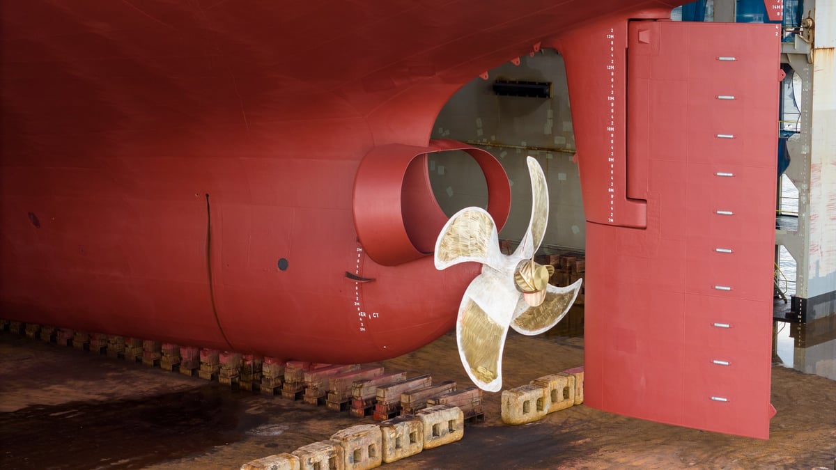 Close-up of a large ship propeller in the water