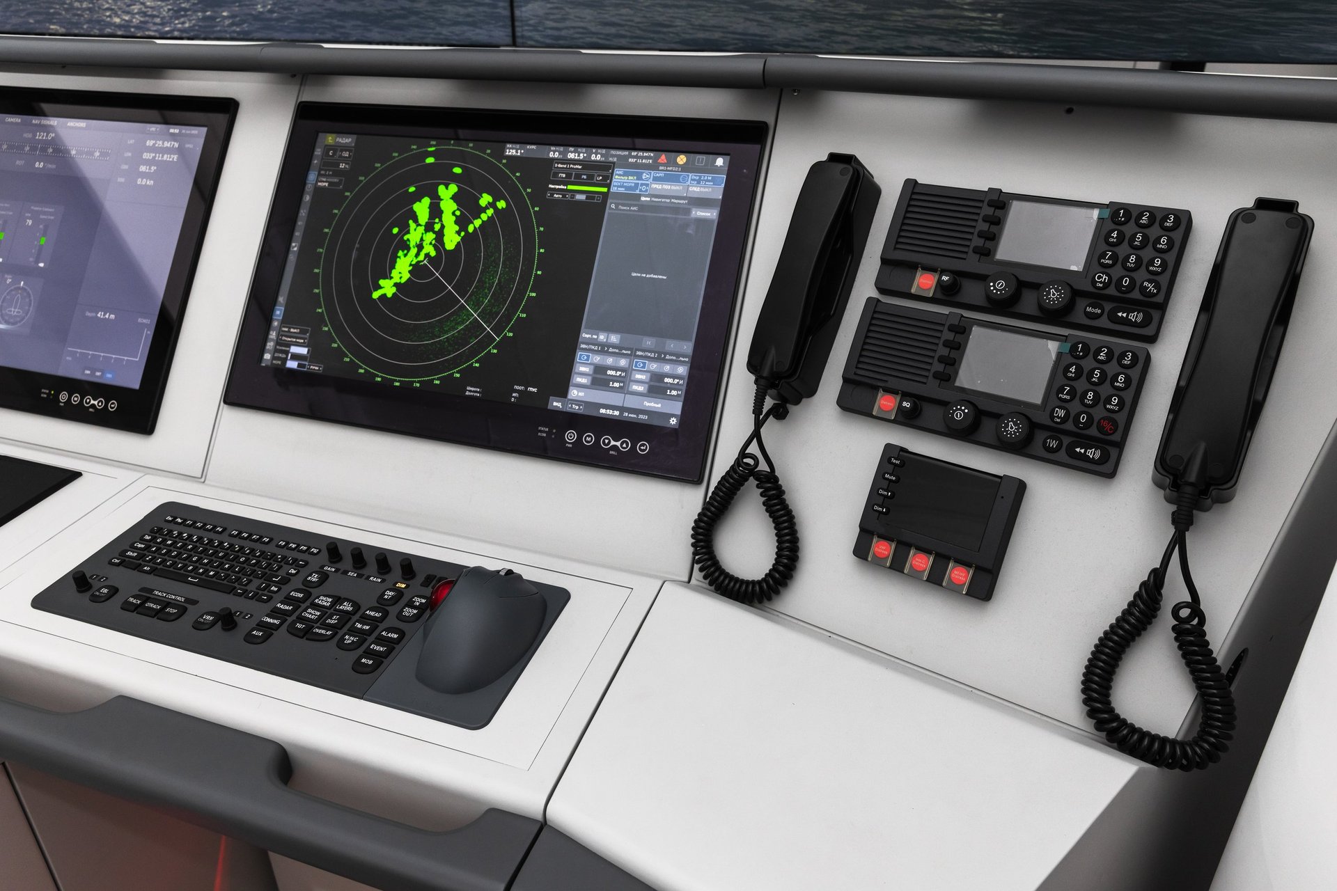 Modern ship bridge navigation console with radar and communication equipment