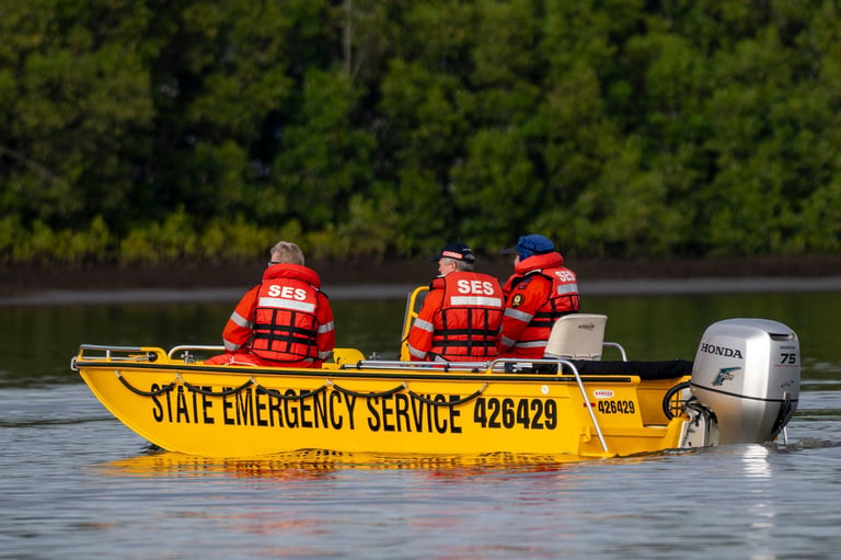 Rescue workers in a rescue boat on calm water
